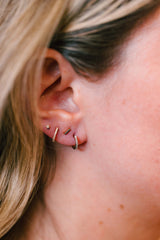 Diamond Huggie Earrings 14k White Gold 10.5mm - 0.12ctw modeled