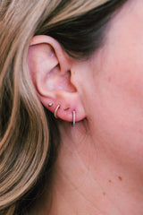 Diamond Huggie Earrings - 14k White Gold - 11mm - 0.10ctw modeled