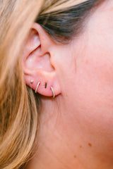Diamond Huggie Earrings - 14k Yellow Gold - 10.5mm - 0.09ctw modeled