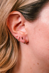 Gold Huggie Earrings 14k Yellow Gold - 11.5mm modeled