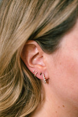 Graduated Diamond Huggie Earrings 14k Yellow Gold 15mm - 0.47ctw modeled
