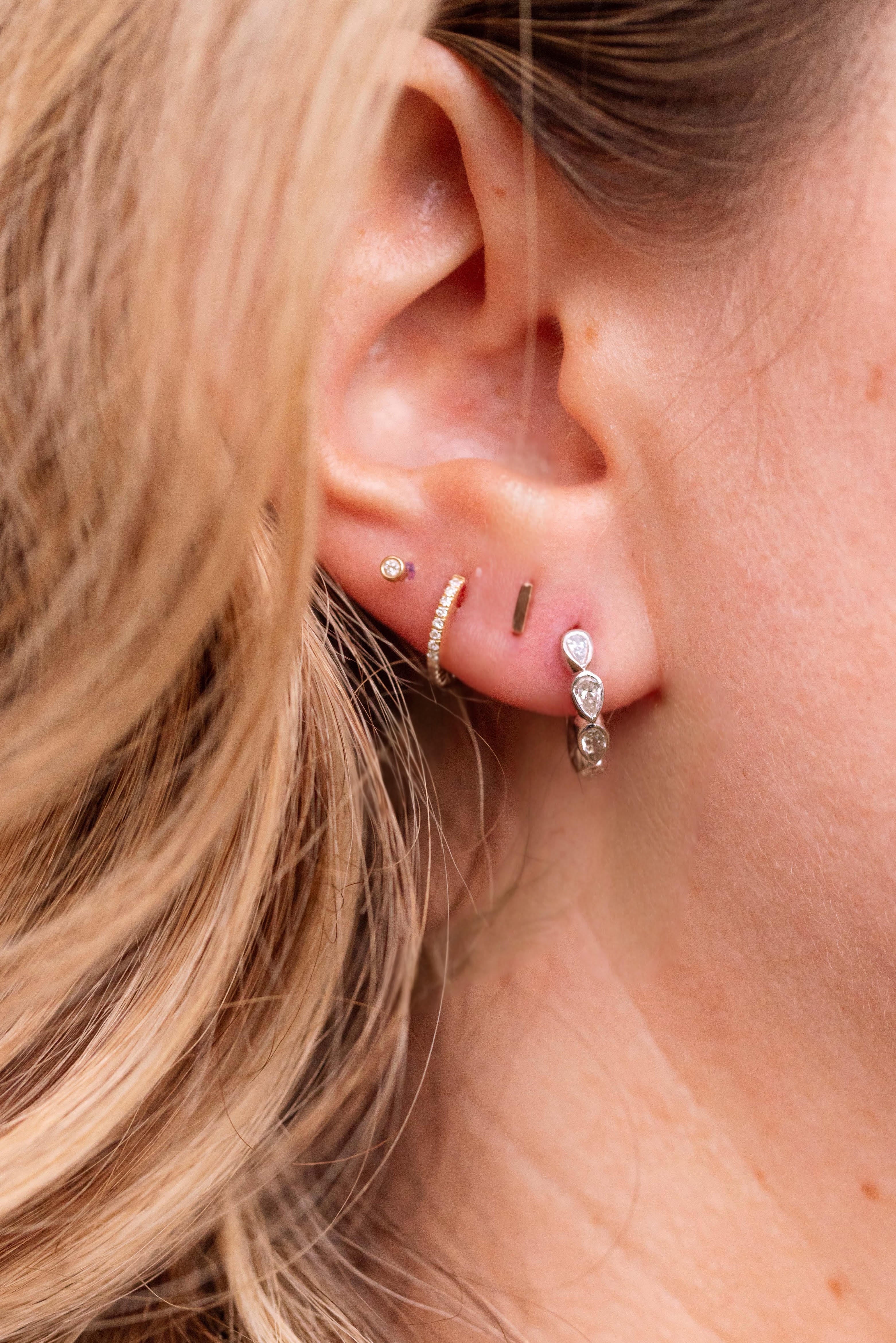 Lab Grown Diamond Bezel Pear Huggie Earrings 14k White Gold 13mm - 0.75ctw modeled